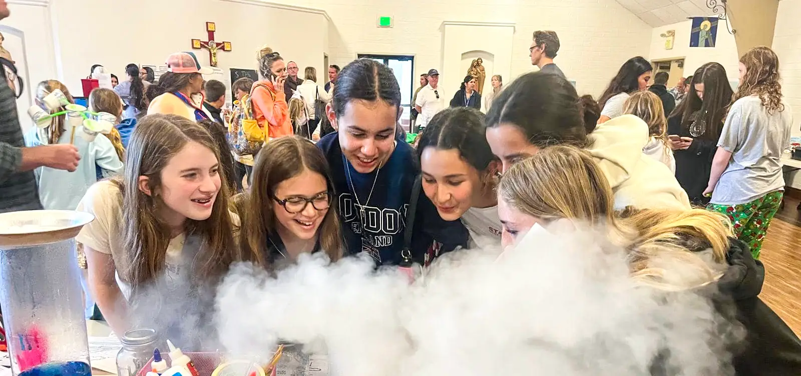 Students with a STEM experiment